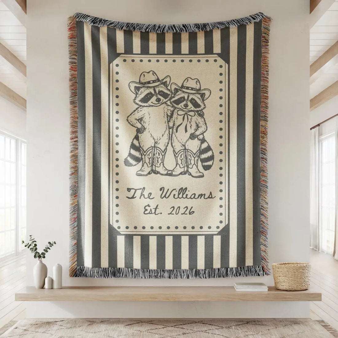 Close-up of the personalized cowboy raccoon striped woven blanket with texture and fringe detail
