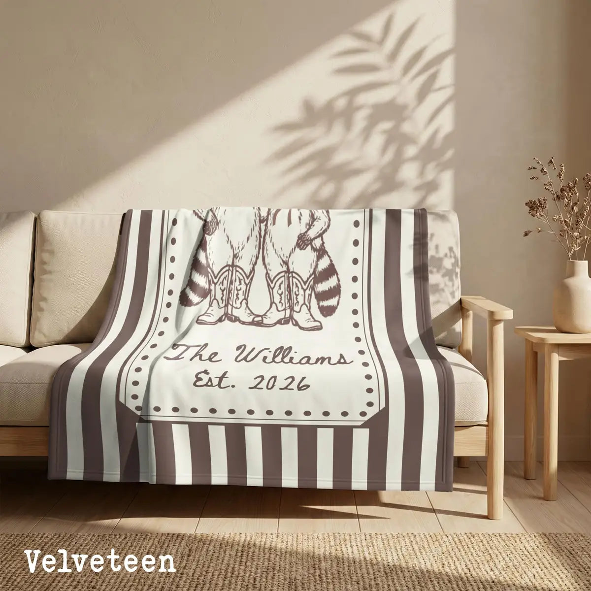 Personalized cowboy raccoon striped woven blanket shown in a styled room setting