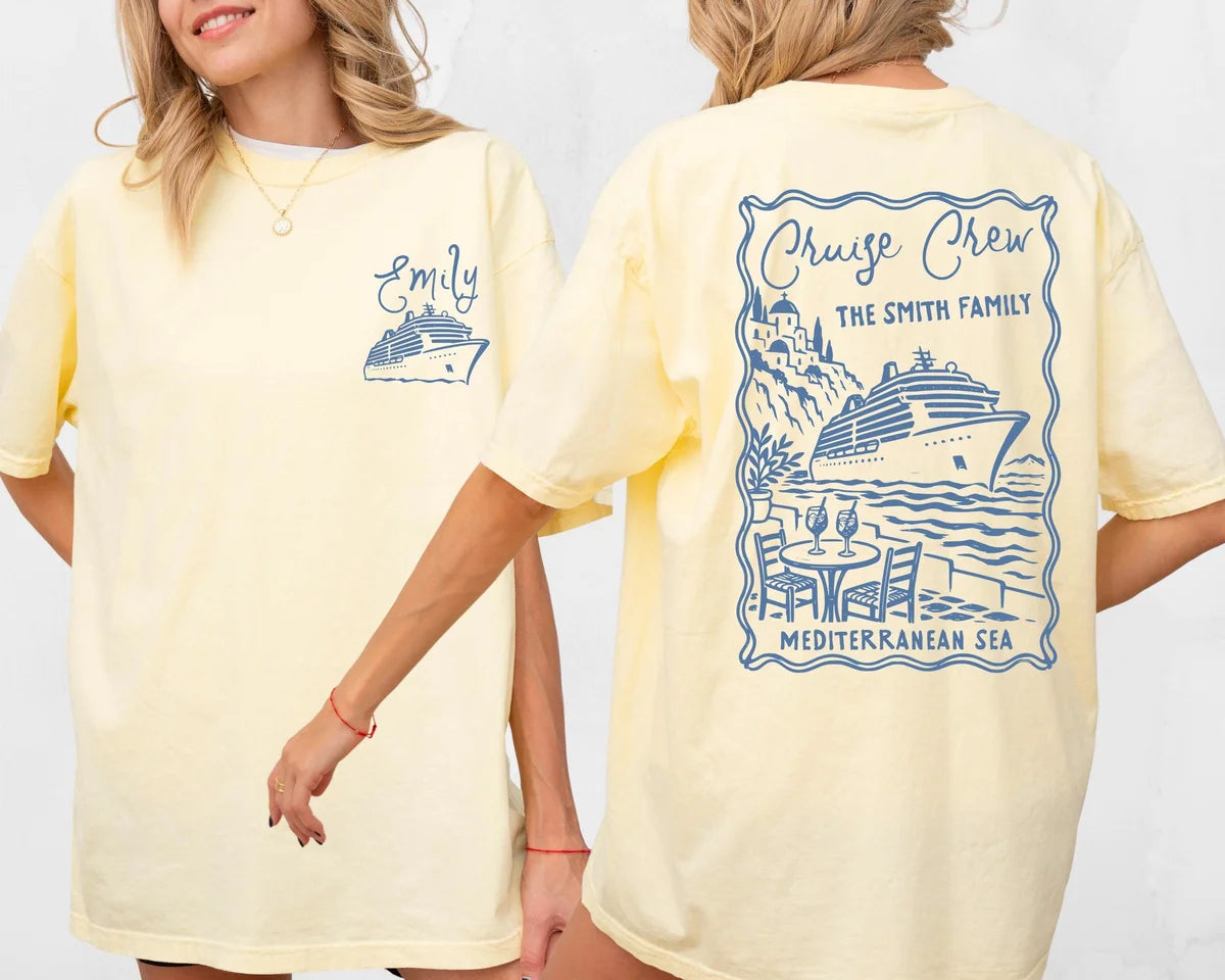 Two women in Butter yellow tees, front with a small blue cruise ship and Emily, back with Cruise Crew Mediterranean Sea