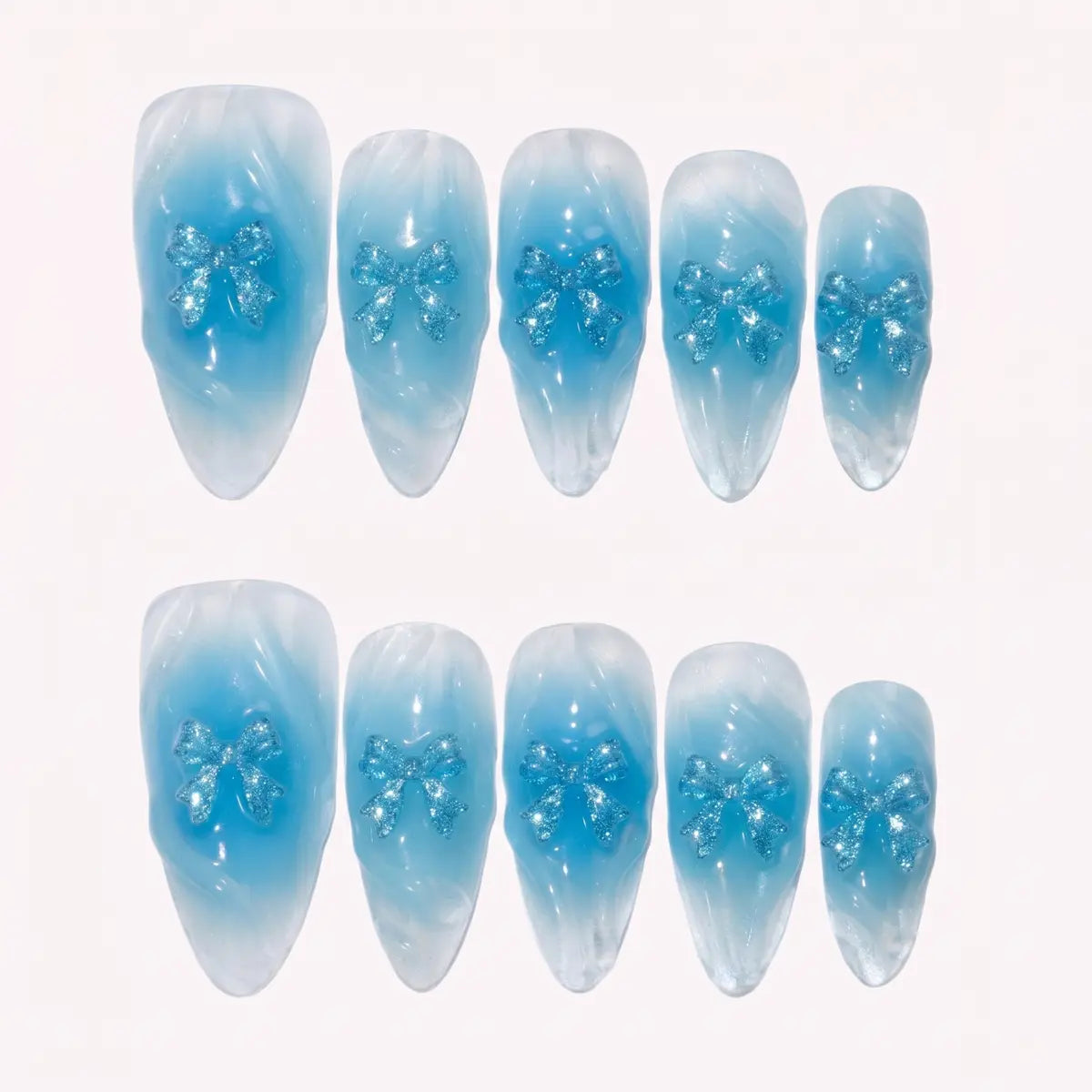 crystal blue 3d almond press on nails glitter ribbon bow flat lay 01
