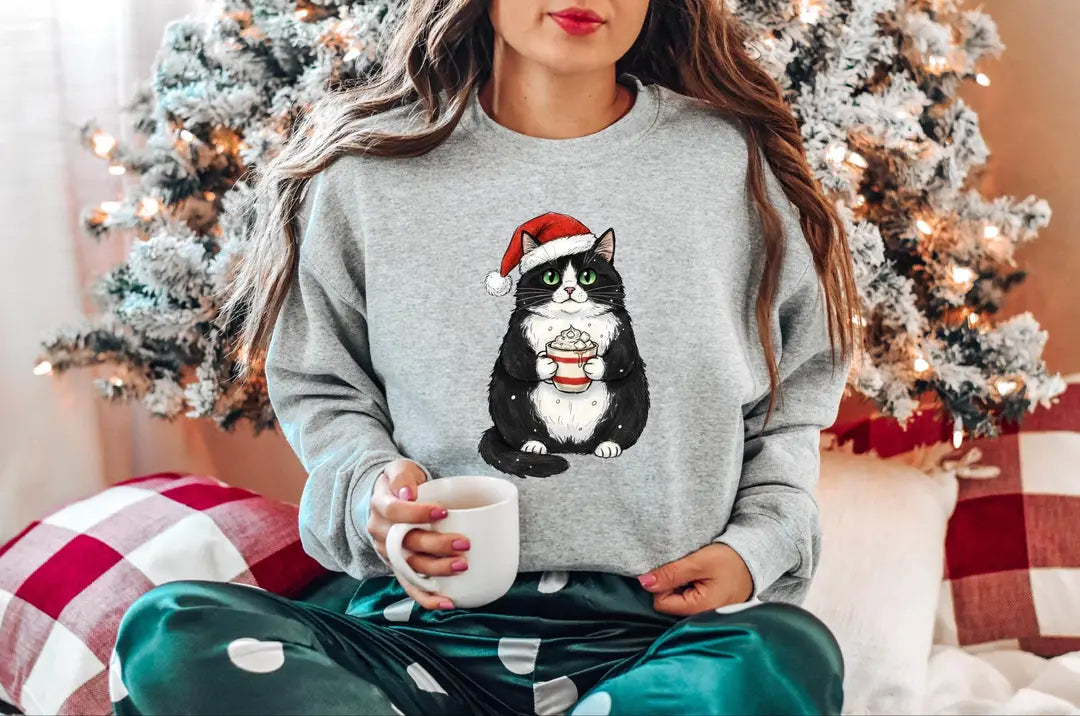 Cute Christmas Black Cat crewneck sweatshirt pictured in Sport Grey.