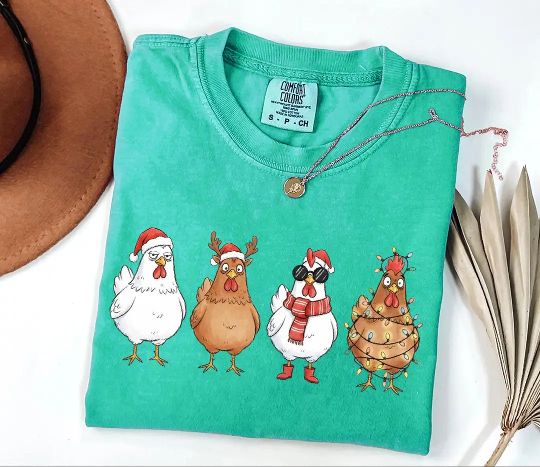 Funny Christmas Chickens in Holiday Costumes graphic Comfort Colors T-shirt, additional product photograph.