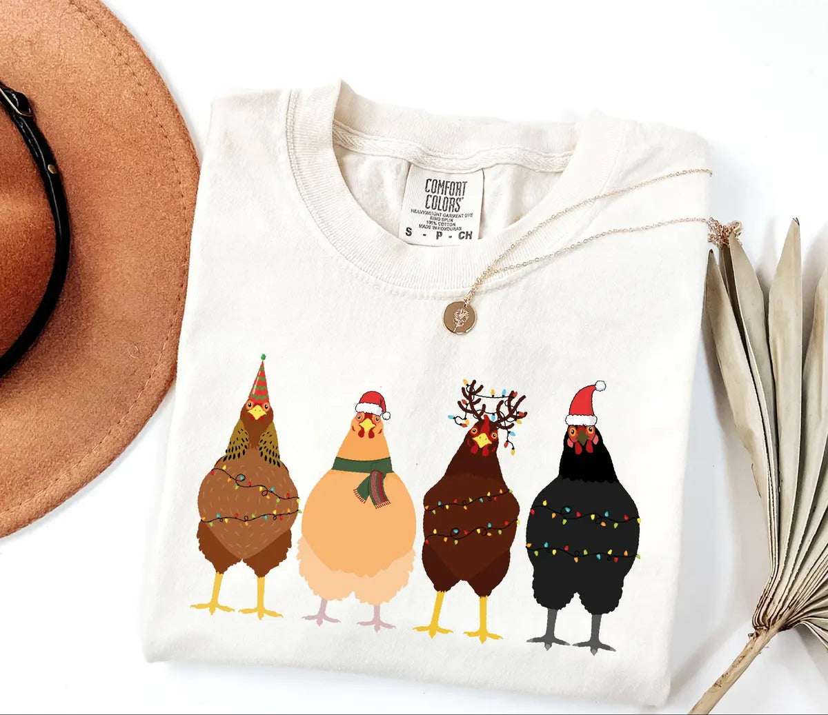Four Christmas Chickens with String Lights graphic Comfort Colors T-shirt, additional product photograph.