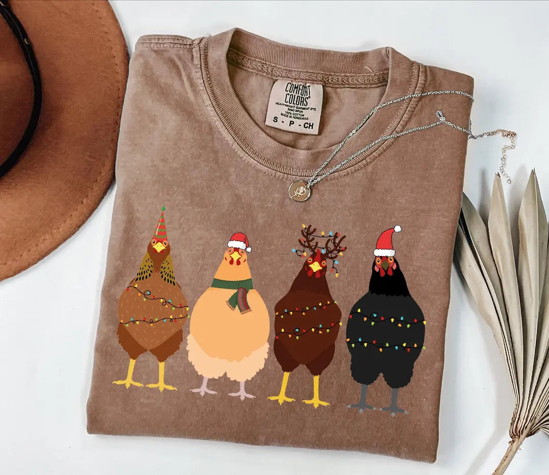 Four Christmas Chickens with String Lights graphic Comfort Colors T-shirt, additional product photograph.