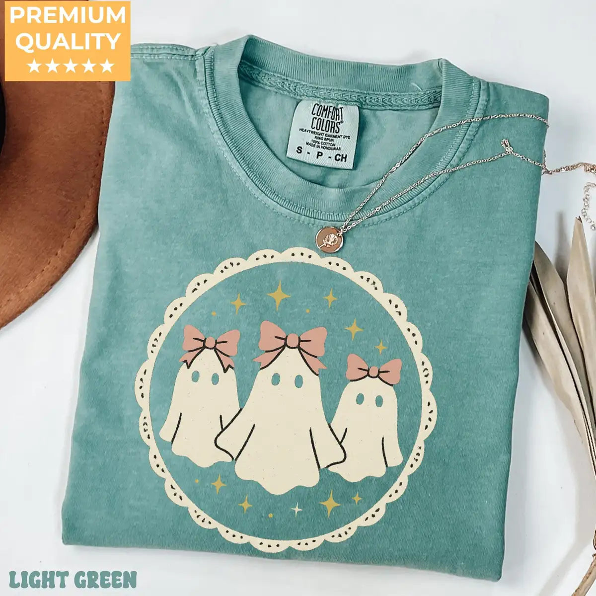 Comfort Colors T-shirt in Crunchberry color featuring ghosts with bows graphic