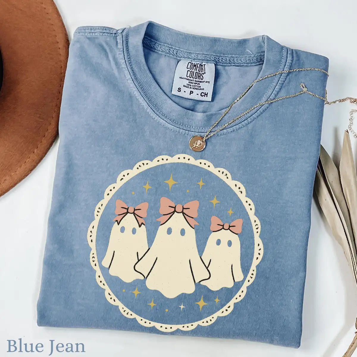 Comfort Colors T-shirt in Pepper color featuring ghosts with bows graphic