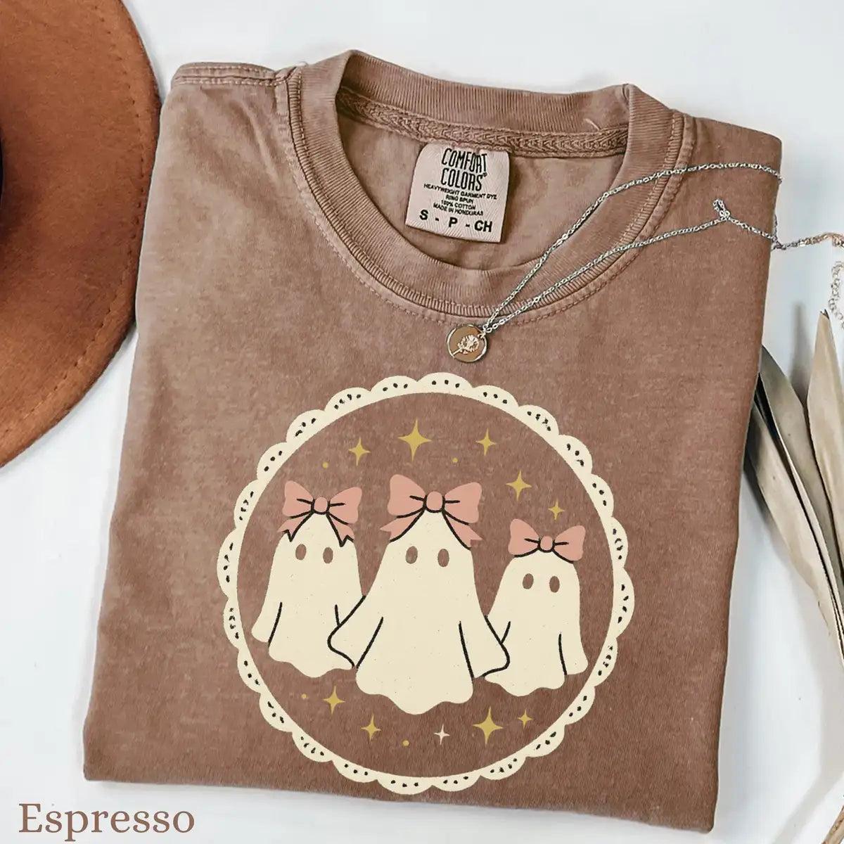 Comfort Colors T-shirt in Violet color featuring ghosts with bows graphic