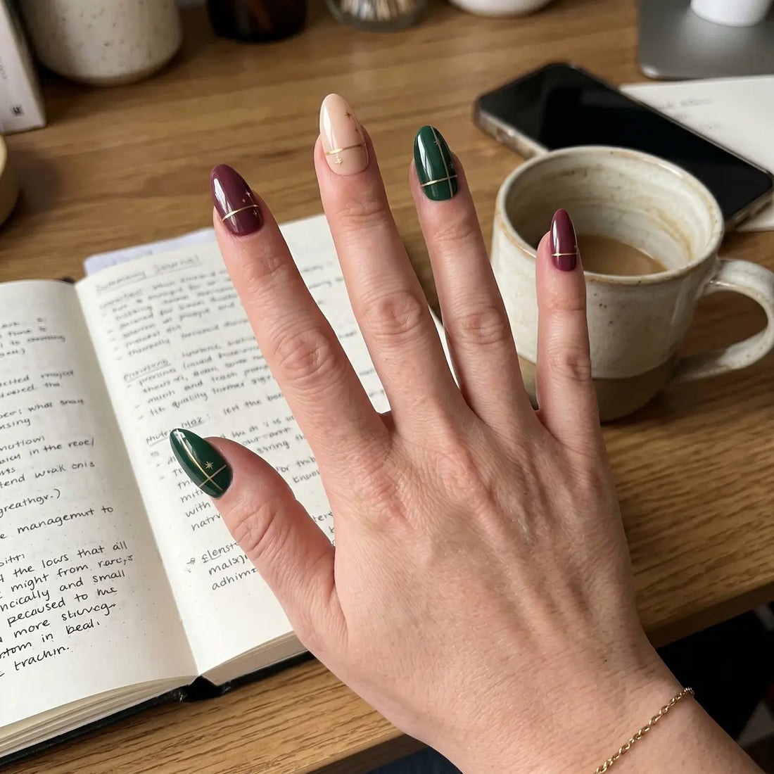 dark green burgundy hand painted almond press on nails gold star lifestyle 02