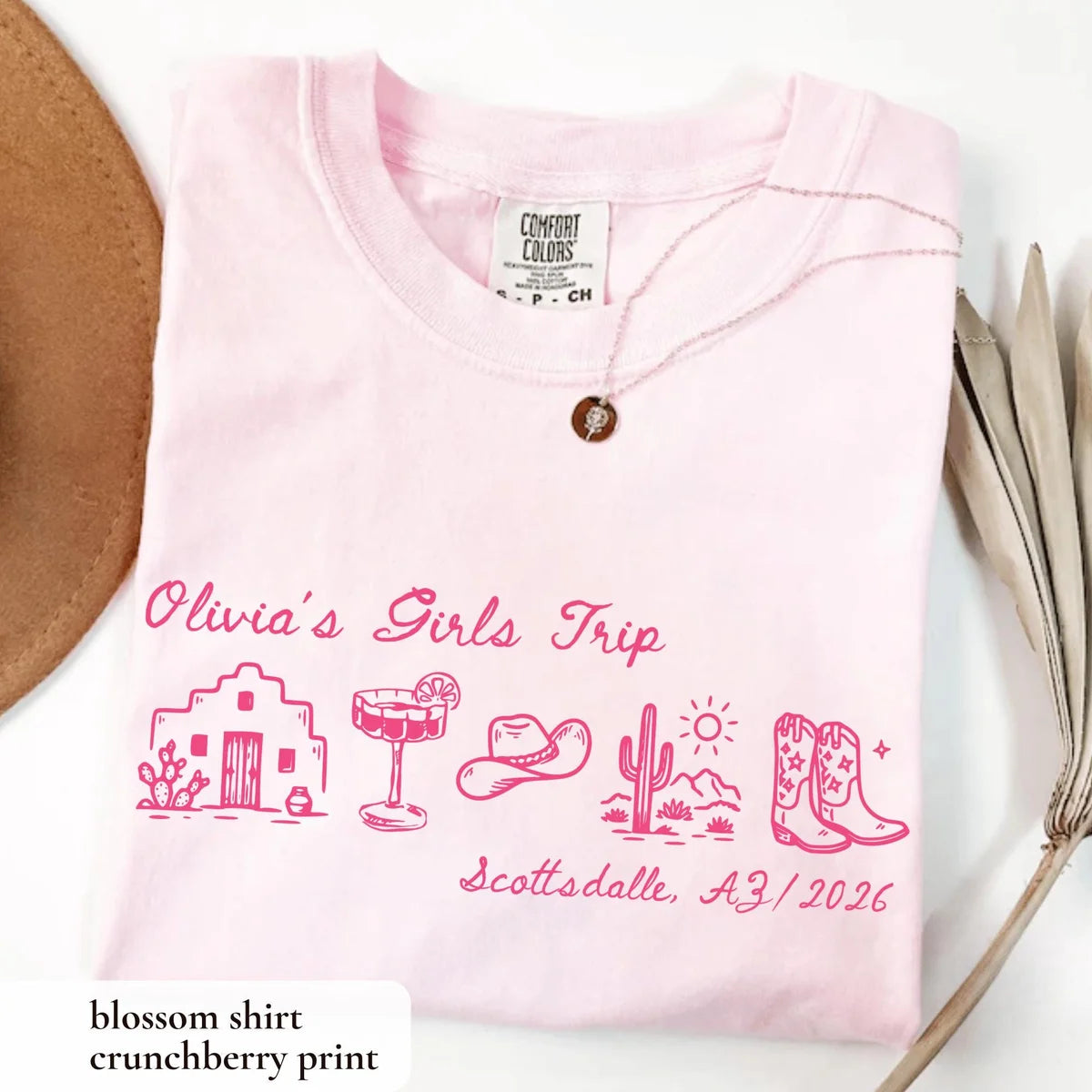 Folded Blossom pink Comfort Colors tee with hot pink Olivia's Girls Trip script, adobe house, cactus and boots