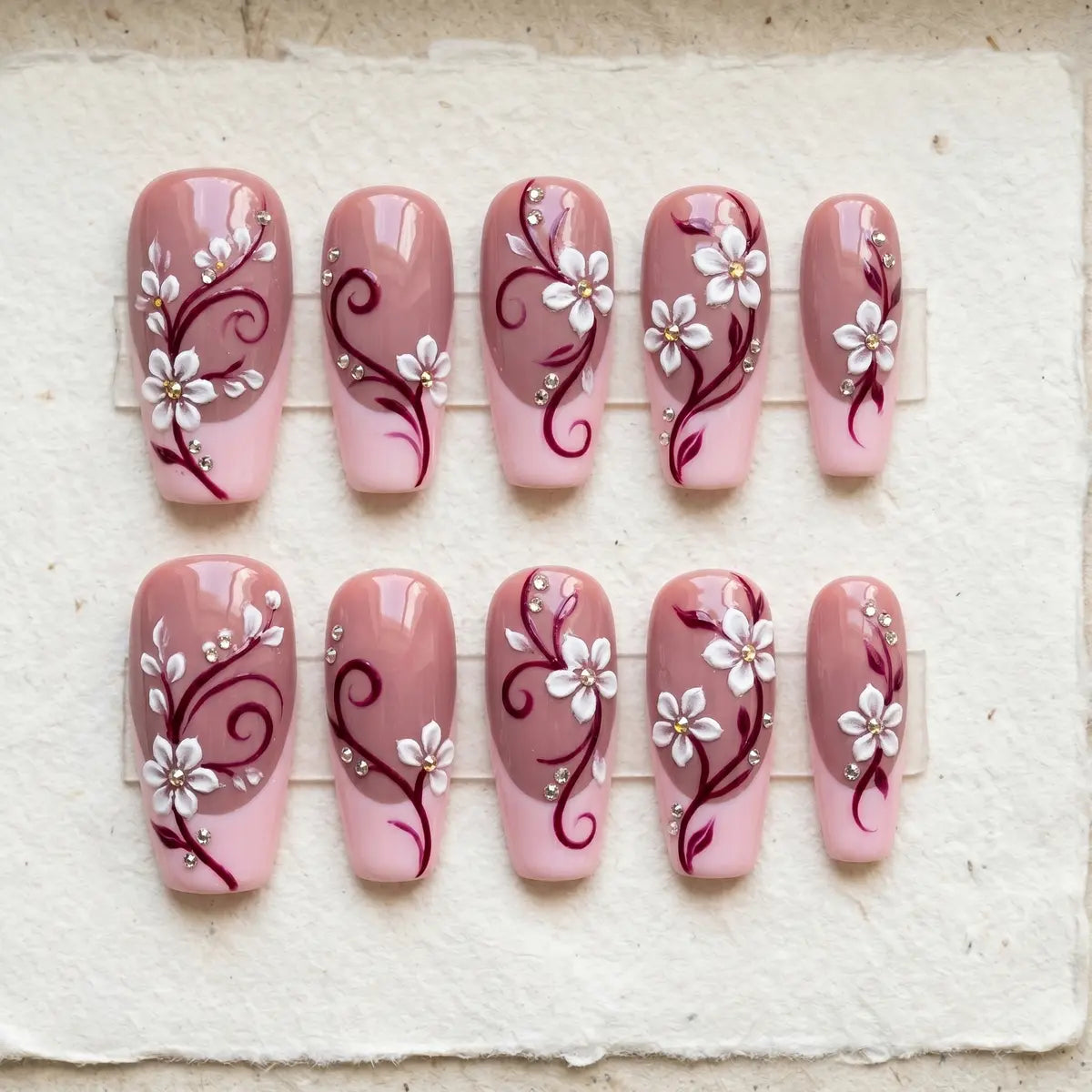 dusty rose 3d coffin long press on nails sakura floral swirl flat lay 01