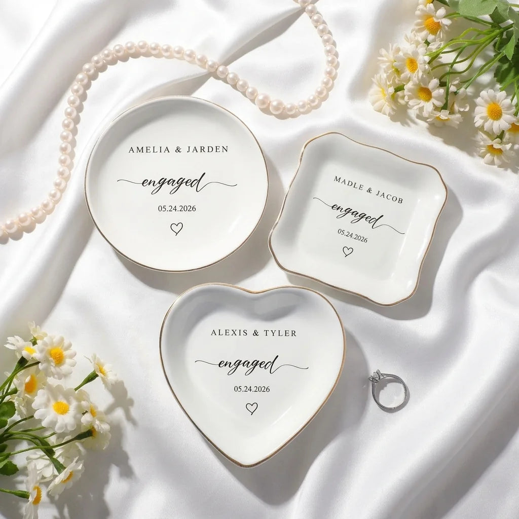 Heart-shaped personalized engaged ring dish with daisies and pearl necklace