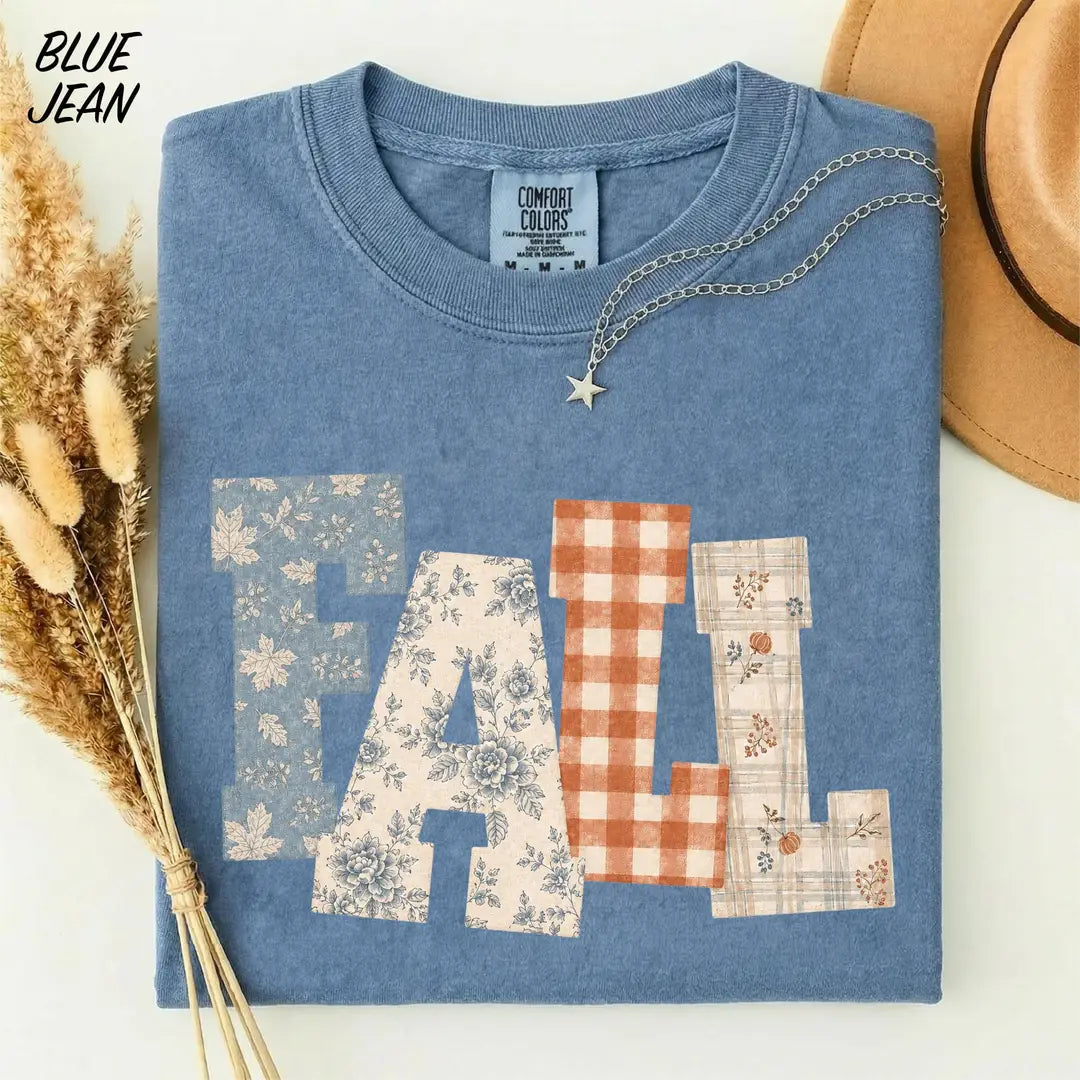 Blue Jean Comfort Colors 1717 T-shirt with large floral, gingham and plaid FALL patchwork lettering.