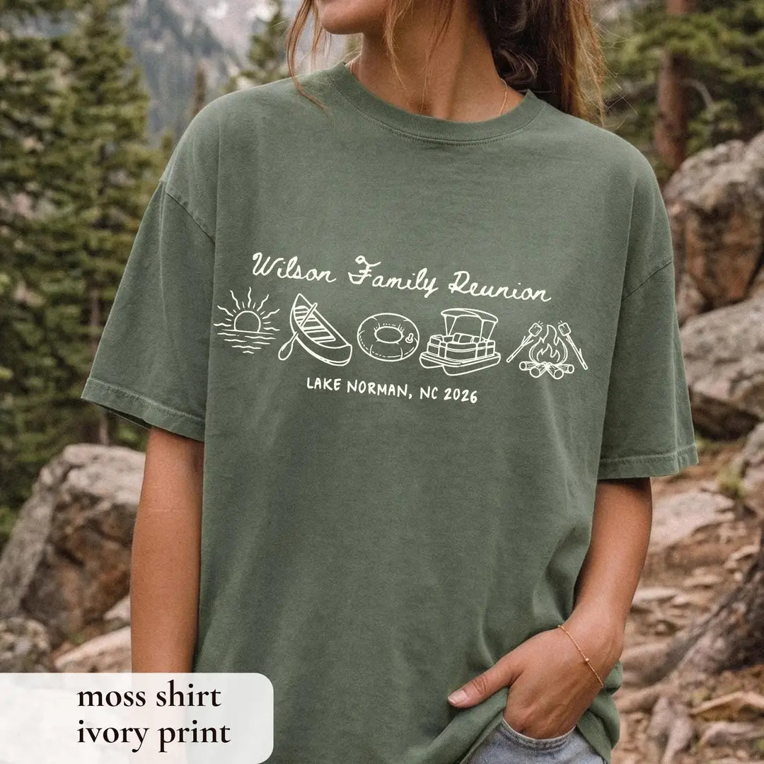 Woman in a Moss green Comfort Colors tee on a rocky trail, ivory Wilson Family Reunion with canoe, pontoon and campfire