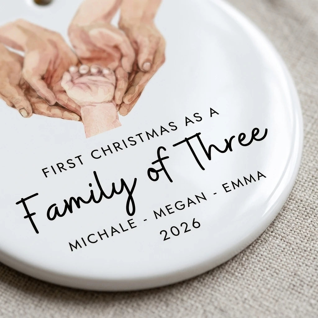 first christmas as a family of three holding hands personalized ornament detail