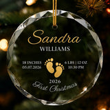 Clear glass round ornament featuring gold baby footprints and custom birth statistics details with detail view