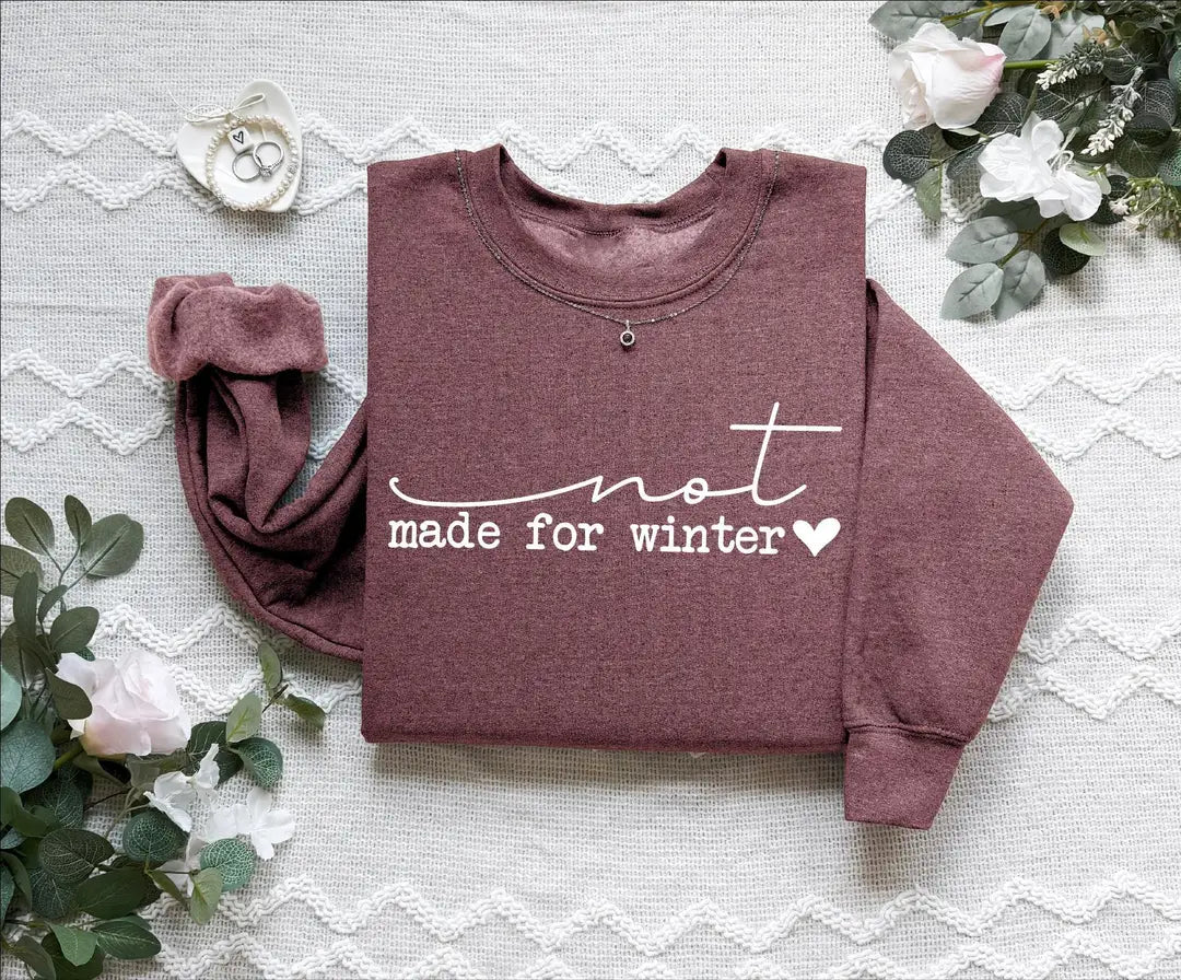 Funny Winter : Not Made For Winter Crewneck Sweatshirt alternate product view in Maroon.