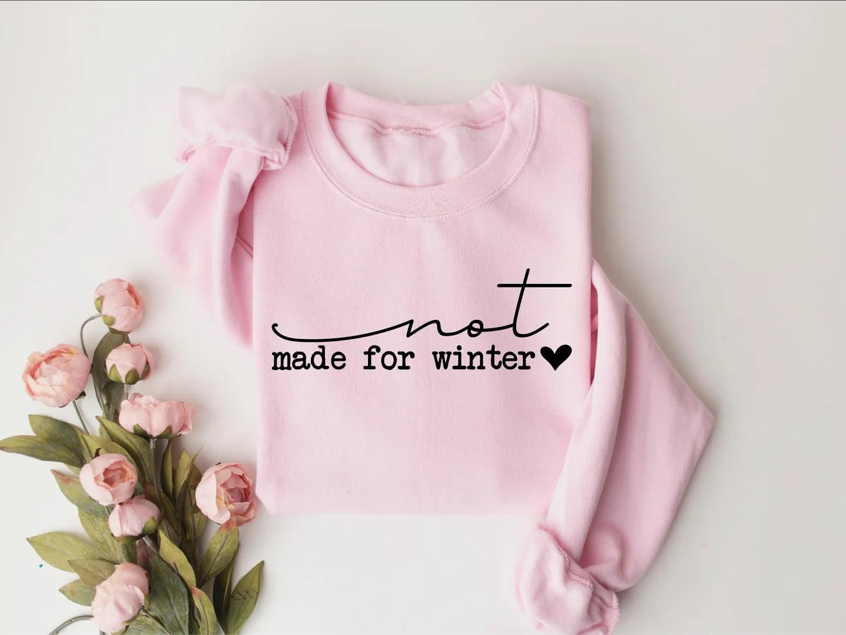 Funny Winter : Not Made For Winter Crewneck Sweatshirt alternate product view in Pink.