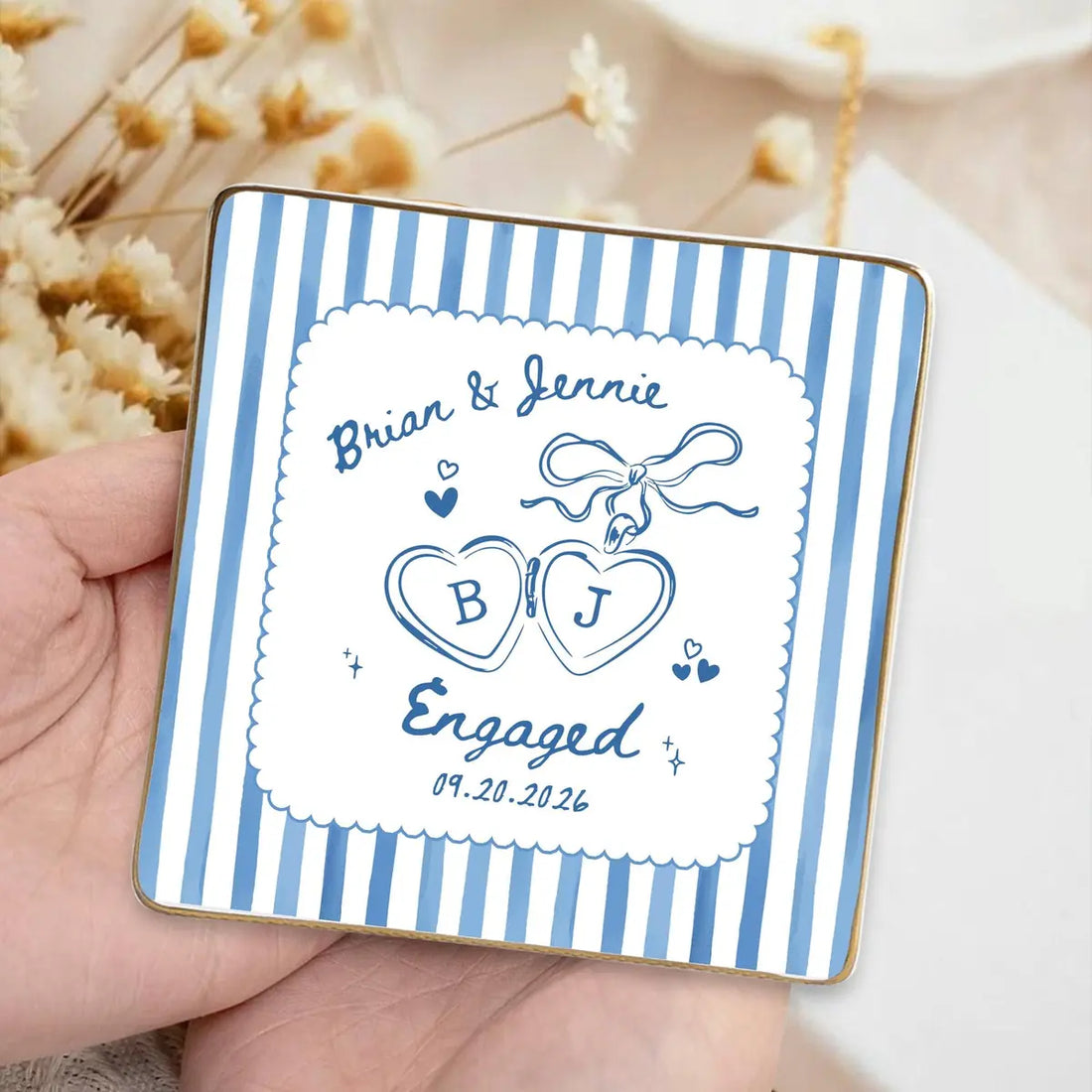 Custom photo engaged ring dish displayed elegantly on wooden bedroom nightstand