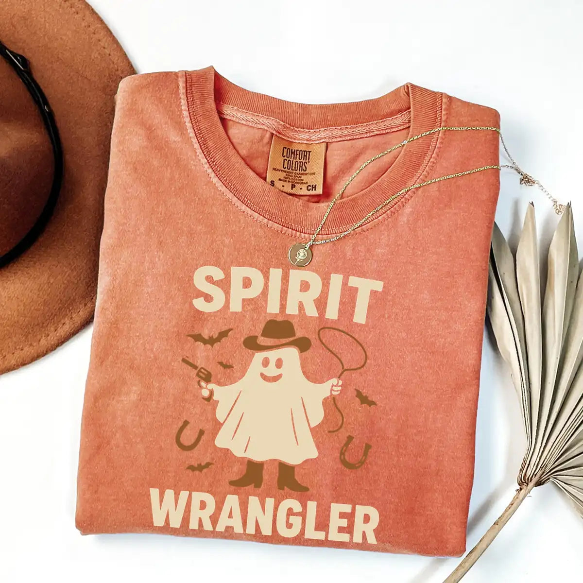 Comfort Colors T-shirt in Terracotta featuring Spirit Wrangler cowboy ghost graphic