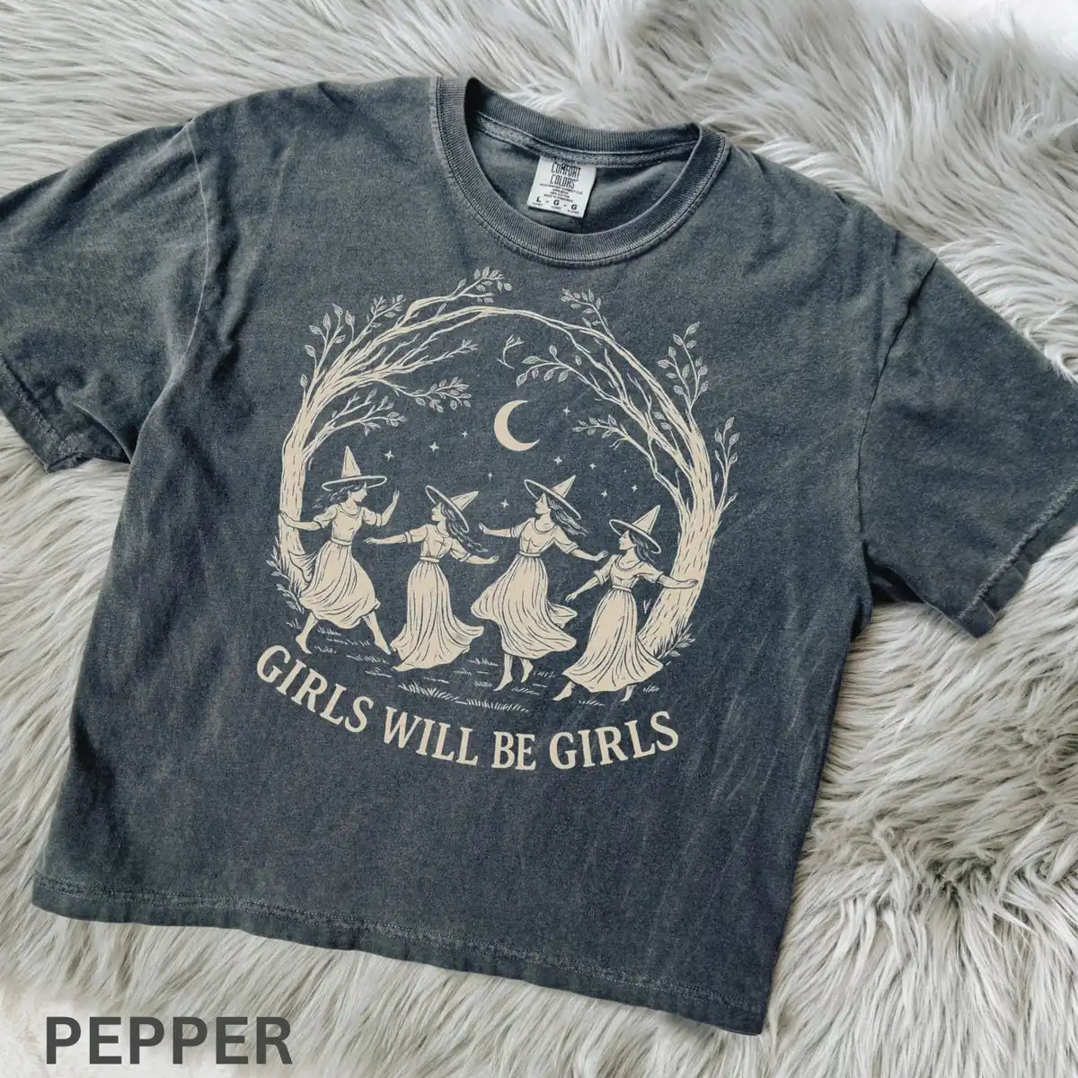 Comfort Colors T-shirt flatlay in Pepper color featuring Girls Will Be Girls dancing witches graphic