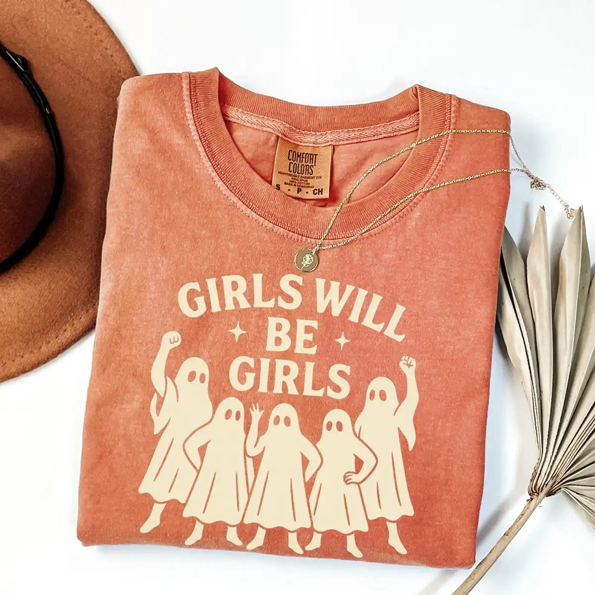 Comfort Colors T-shirt in Crunchberry color featuring Girls Will Be Girls feminist ghosts graphic