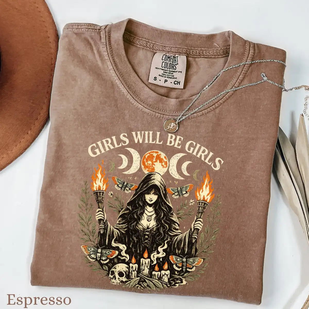 Comfort Colors T-shirt in Crunchberry featuring witch holding torches graphic