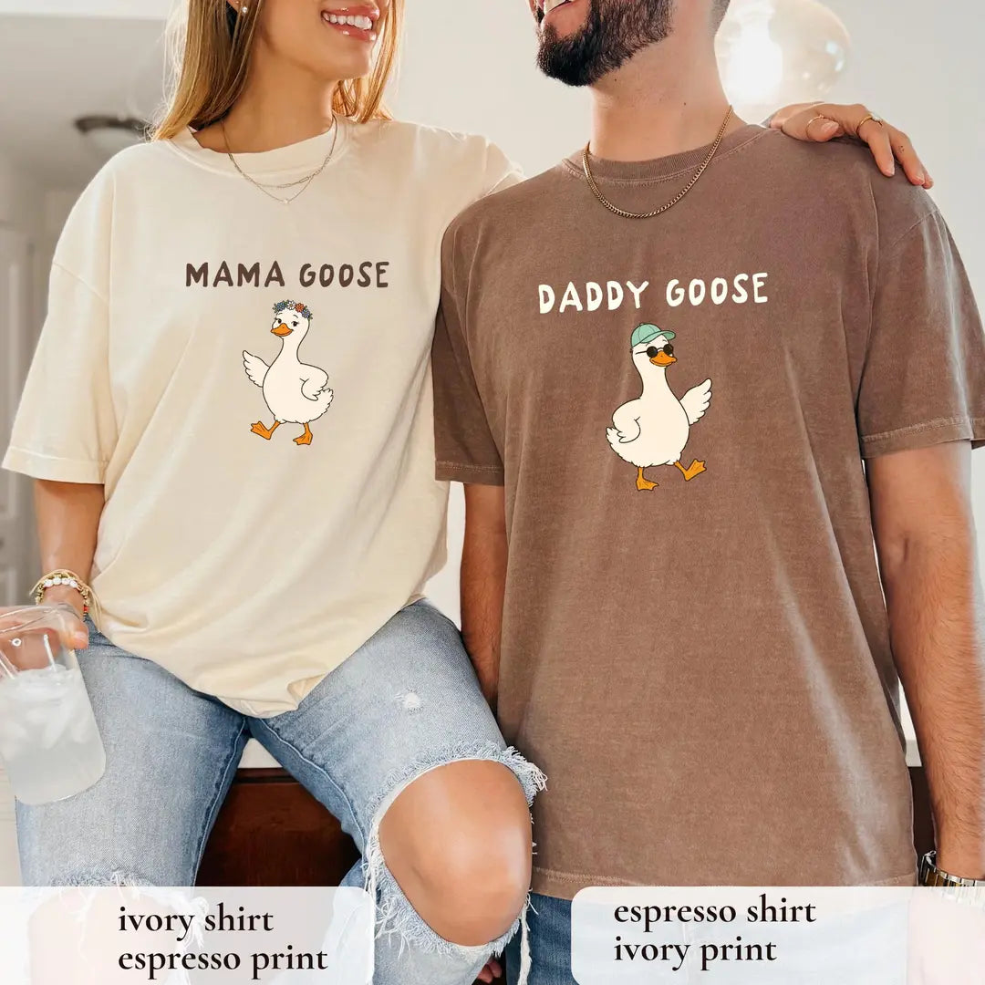 Adult couple wearing Mama Goose Ivory and Daddy Goose Espresso Comfort Colors T-shirts.