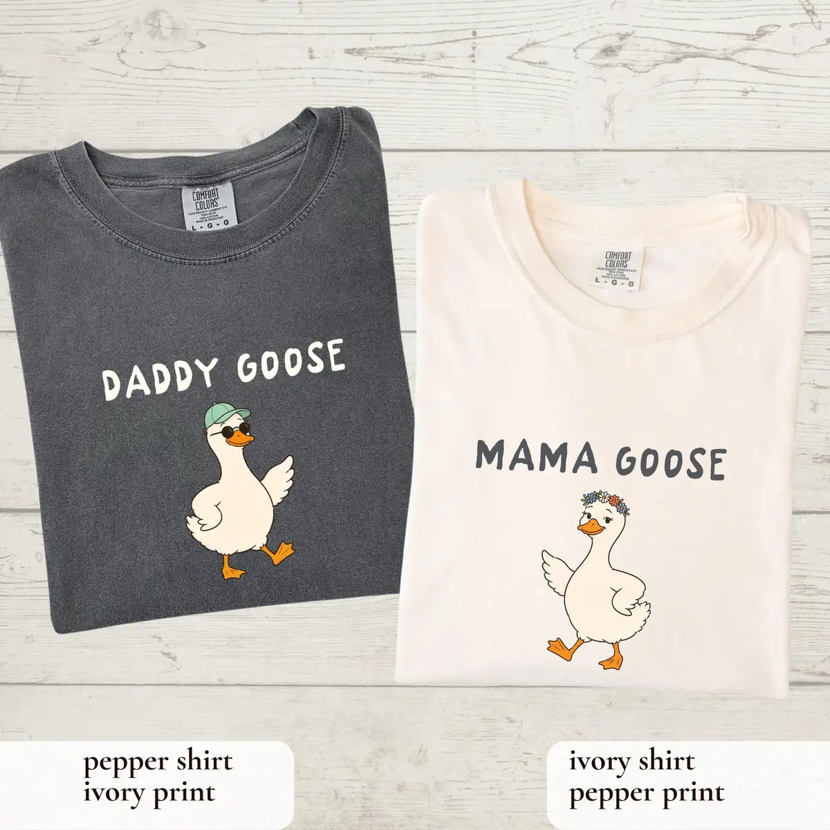 Folded adult Daddy Goose Pepper and Mama Goose Ivory T-shirts showing the two design choices.