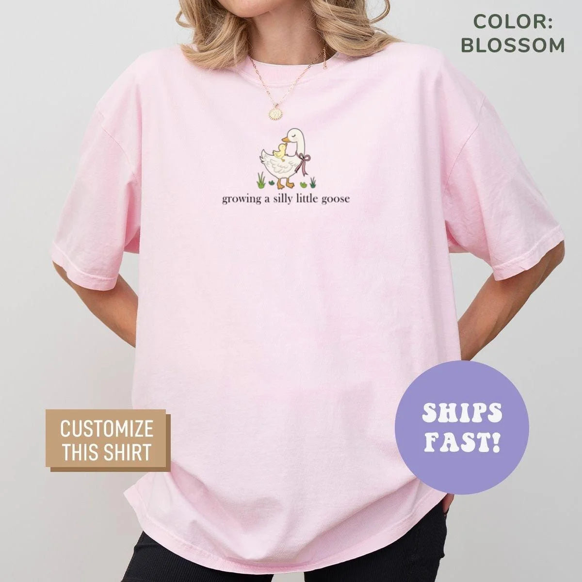 Woman in a Blossom pink Comfort Colors tee with a small goose and ducklings and the words growing a silly little goose
