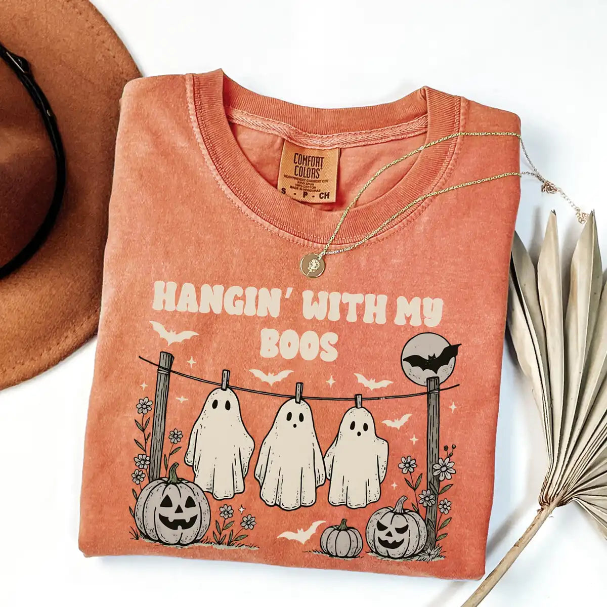 Comfort Colors T-shirt in Yam color featuring Hangin With My Boos ghosts on fence graphic