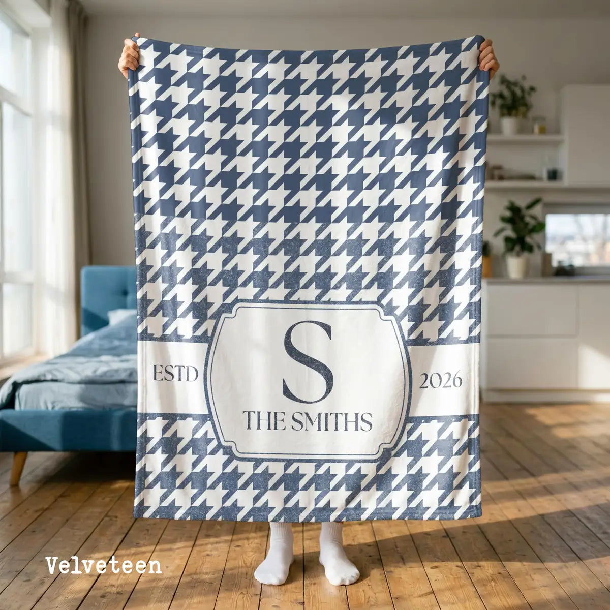 Personalized houndstooth panel woven blanket with monogram shown in a styled room setting