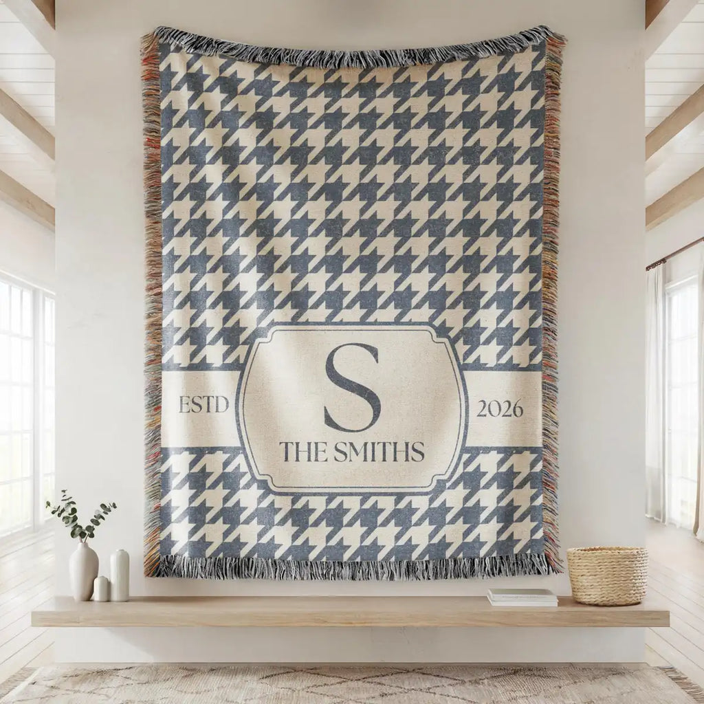 Personalized houndstooth panel woven blanket with monogram shown in a styled room setting
