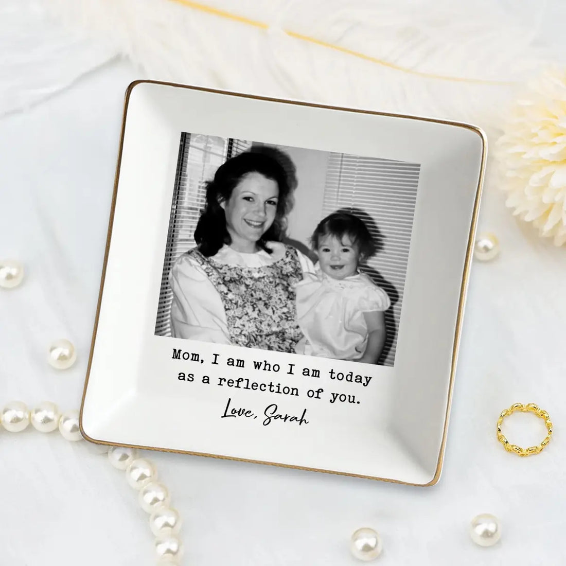 Close-up detail of glossy ceramic finish and gold rim on personalized mom trinket tray