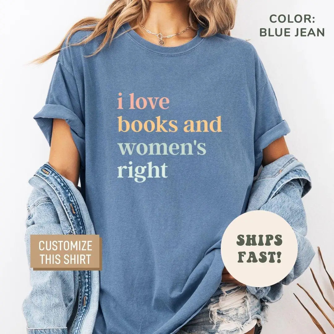 Woman in a Blue Jean Comfort Colors tee and a denim jacket with the stacked i love books text in pastel serif