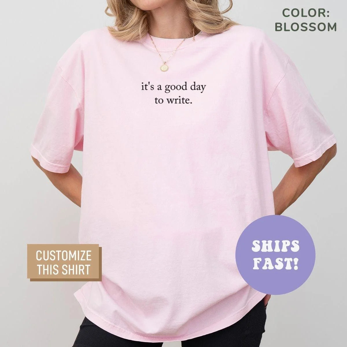 Woman in a Blossom pink Comfort Colors tee, hands on hips, with it's a good day to write in dark serif