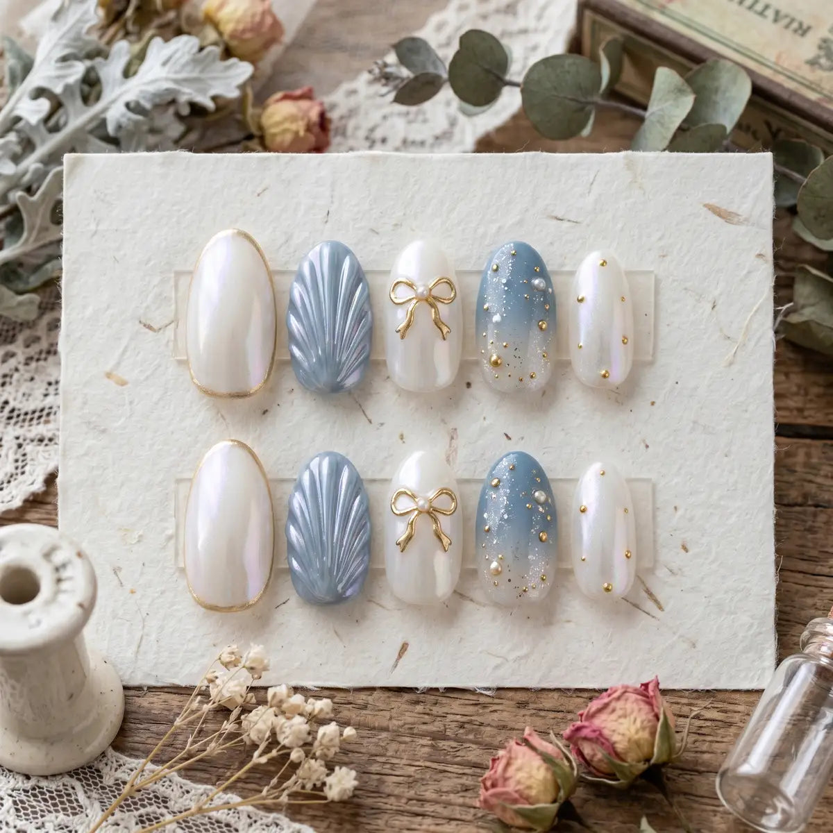 ivory blue gold 3d chrome oval press on nails seashell ribbon pearl mockup 01