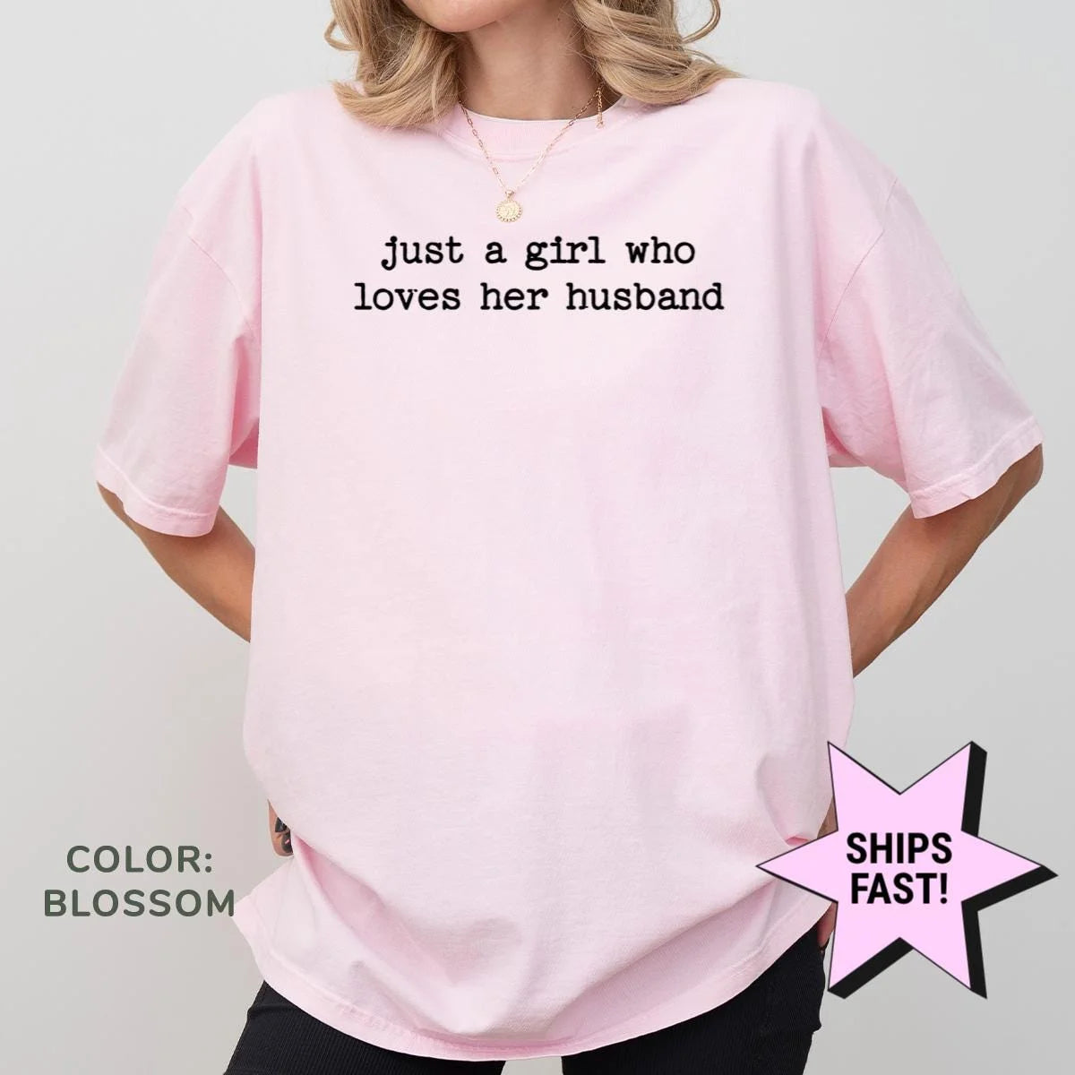 Woman in a Blossom pink Comfort Colors tee with just a girl who loves her husband in black typewriter type