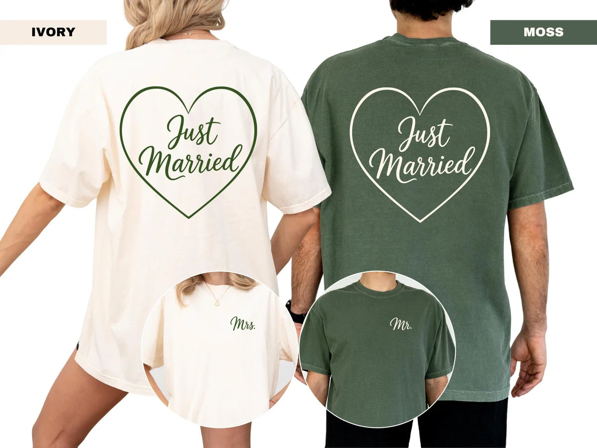 Couple seen from behind in Ivory and Moss Comfort Colors tees, just married hearts on the backs, Mrs. and Mr. on the chests