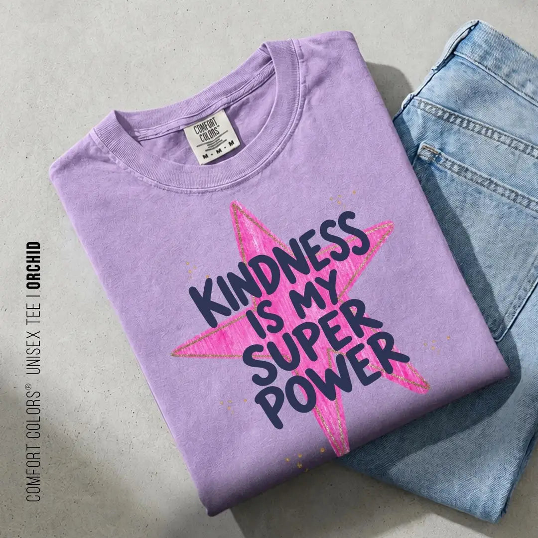 Folded Orchid lavender Comfort Colors tee on blue jeans with navy kindness is my super power on a pink star