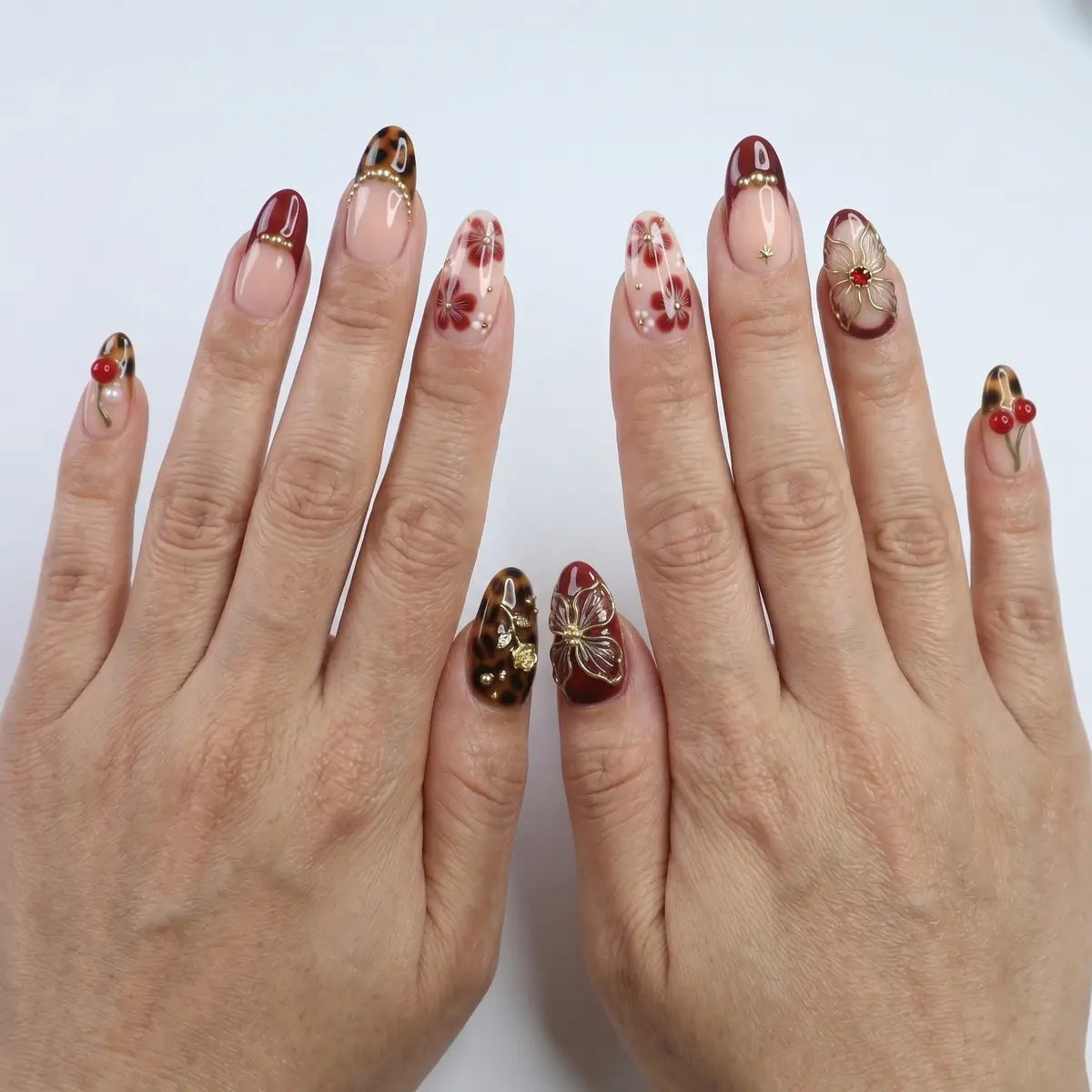 leopard print almond press on nails 3d gold rose cherry butterfly mockup 01