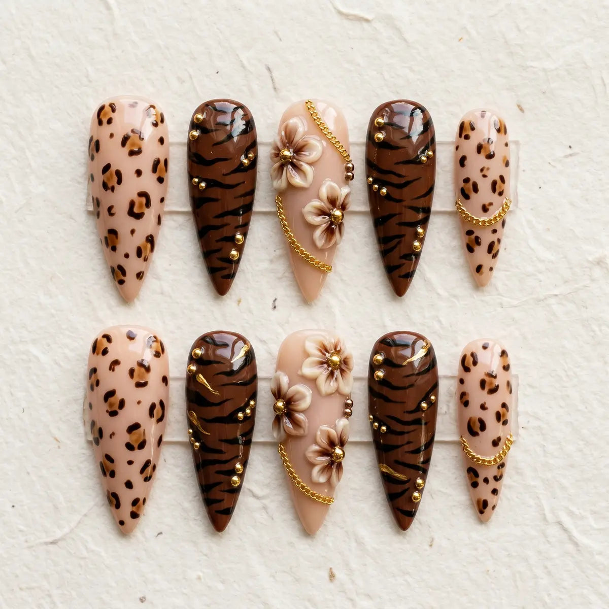 leopard tan 3d stiletto long press on nails tiger chain flat lay 01