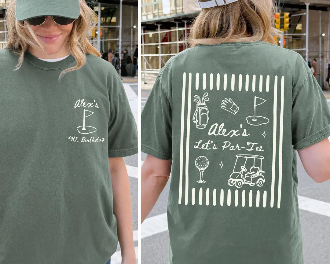 Woman in a Moss green tee and cap, front with a golf flag and Alex's 40th Birthday, back with Let's Par-Tee golf doodles