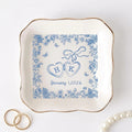 Three personalized locked-hearts ring dishes in blue toile with initials and wedding date
