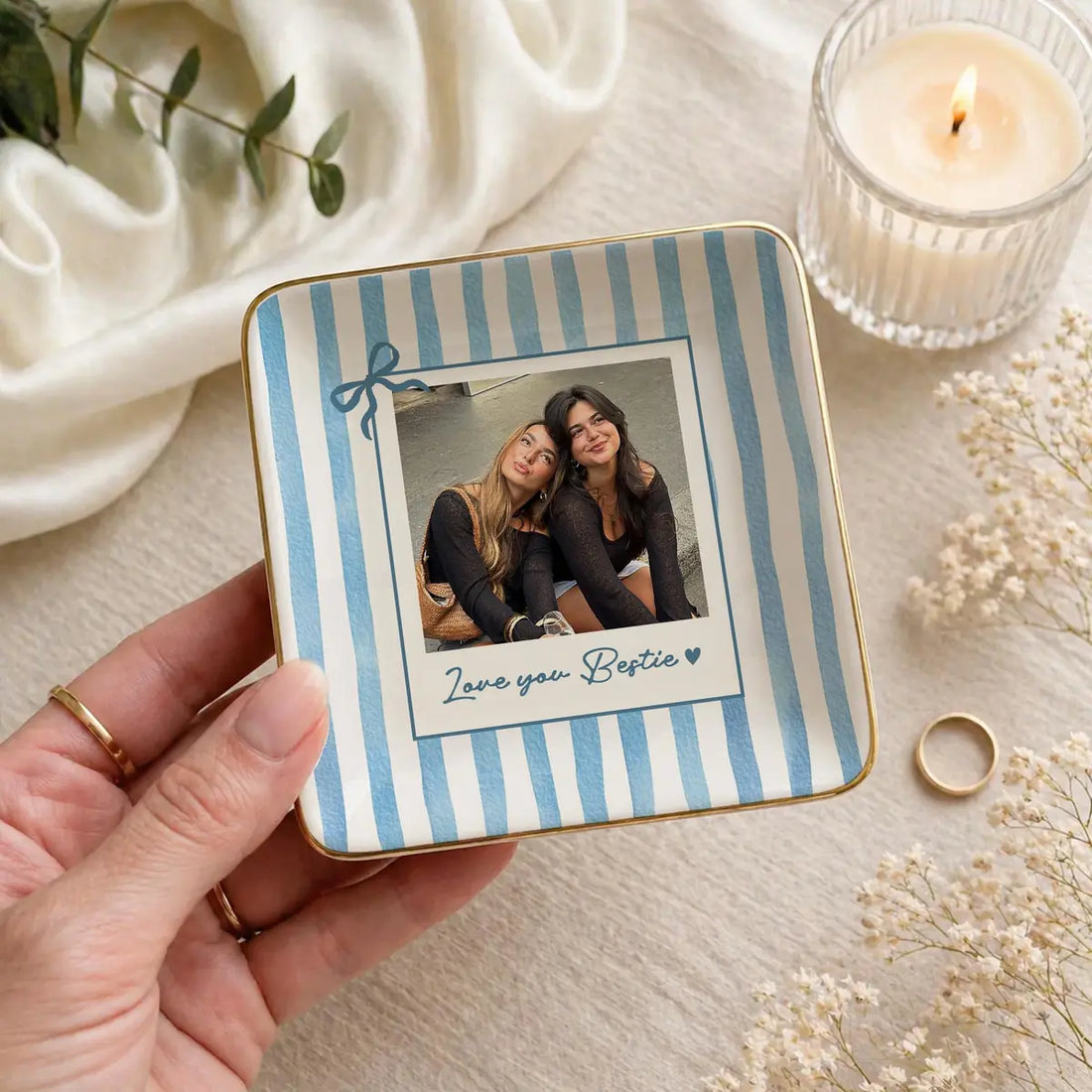 Close-up detail of glossy ceramic finish and gold rim on personalized bestie trinket tray