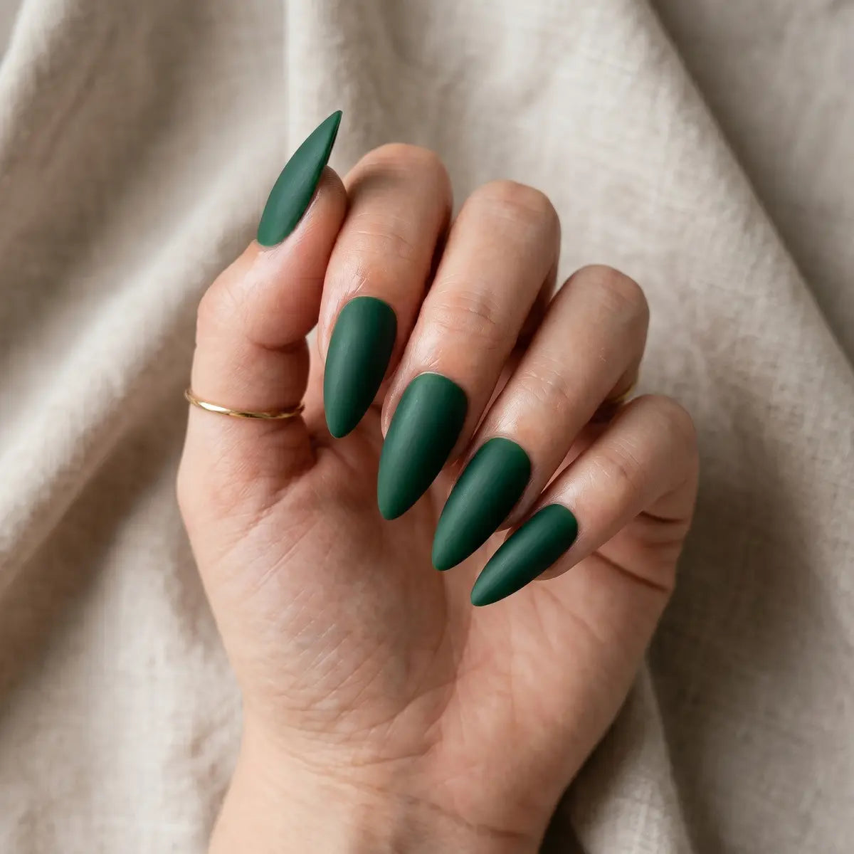 matte emerald green solid color almond press on nails flat lay 04