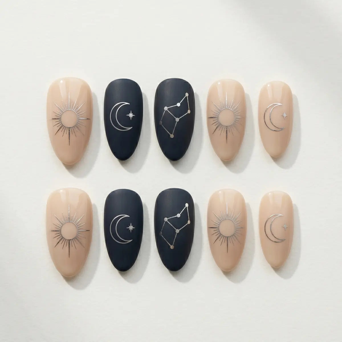 matte navy nude hand painted almond press on nails silver celestial detail 03