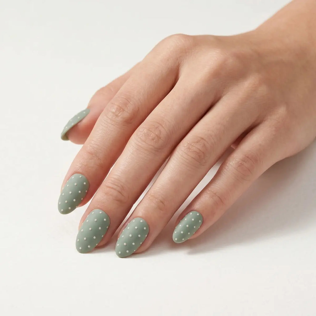 matte sage green hand painted almond press on nails white dot cross detail 03