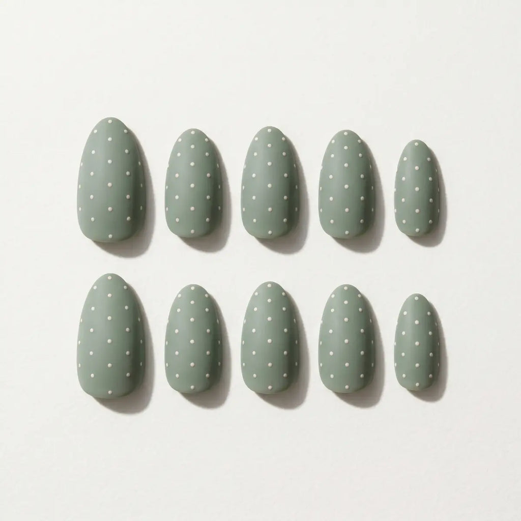 matte sage green hand painted almond press on nails white dot cross mockup 05