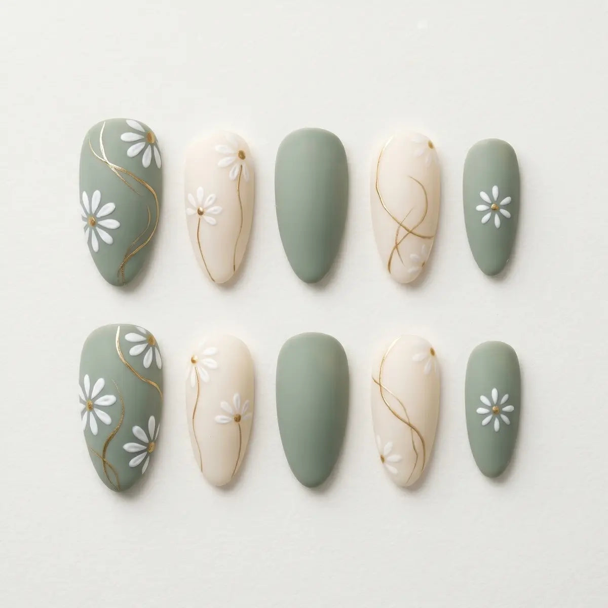 matte sage green nude hand painted almond press on nails daisy gold swirl flat lay 04