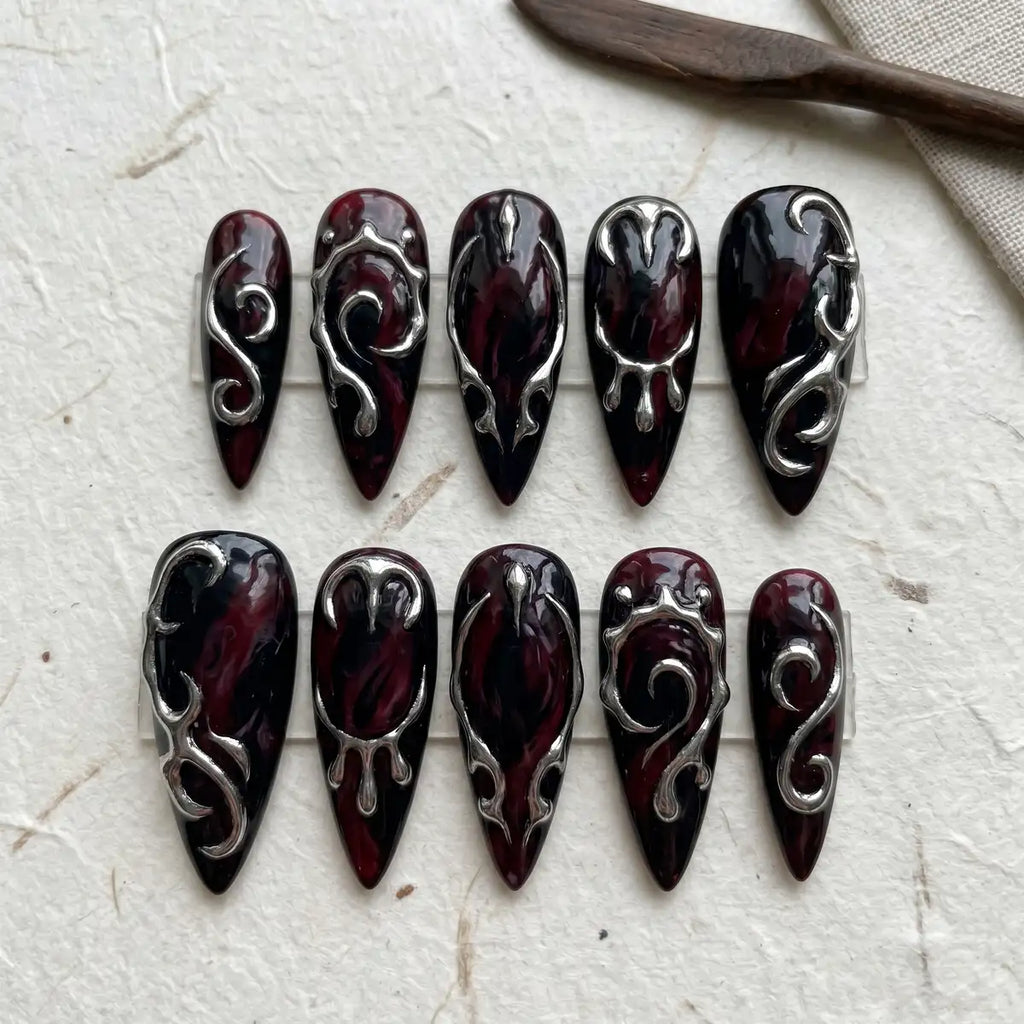 midnight plum 3d stiletto long press on nails silver scroll flat lay 01